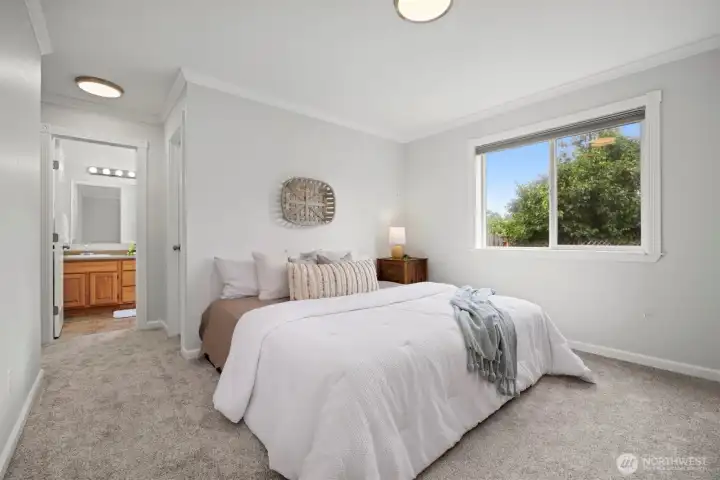 The spacious primary bedroom looks out in to the back yard, and includes a dual vanity ensuite and walk in closet. The spacious primary bedroom looks out in to the back yard, and includes a dual vanity ensuite and walk in closet.