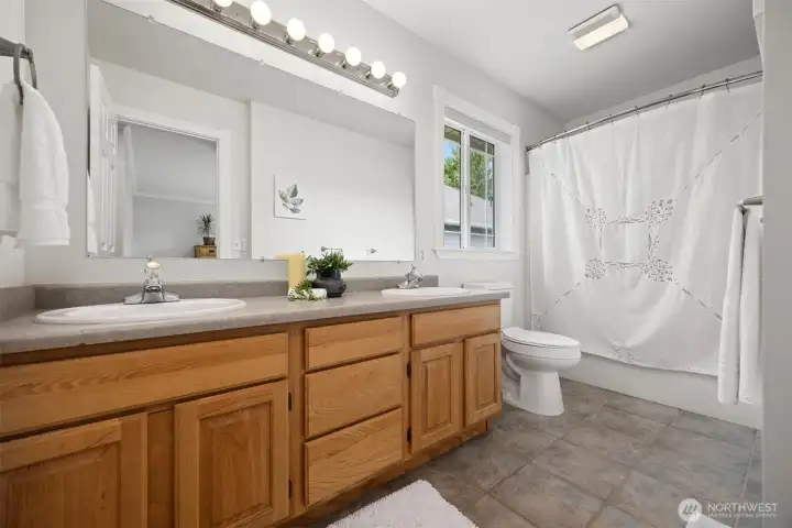 The primary suite features a dual sink vanity with abundant storage, comfort height toilets & tub/shower. The primary suite features a dual sink vanity with abundant storage, comfort height toilets & tub/shower.