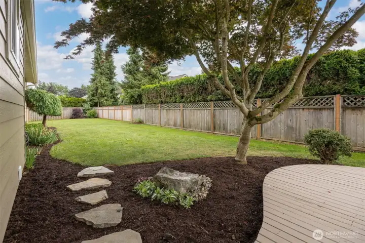 The back yard is well manicured, spacious & private. The back yard is well manicured, spacious & private.