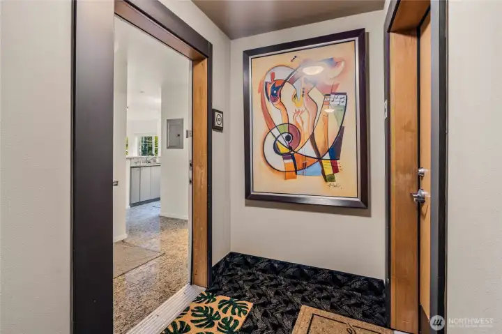 Inviting entry with granite tile flooring