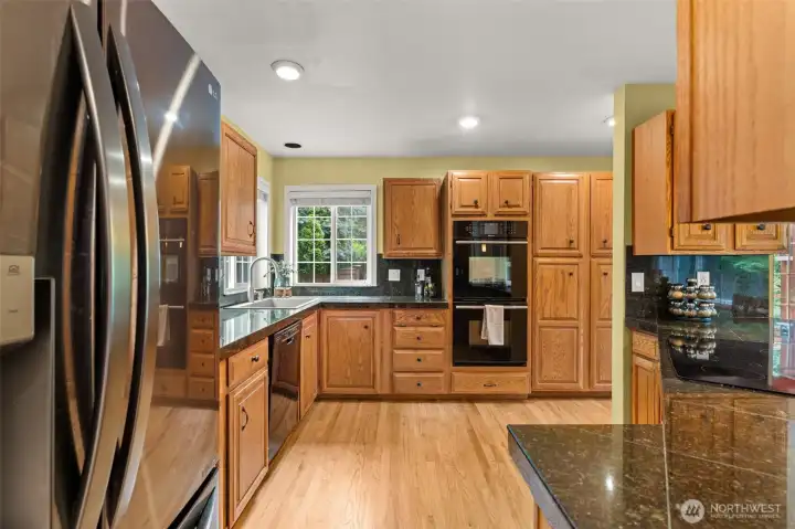 Kitchen w/Black & Black Stainless Appliances
