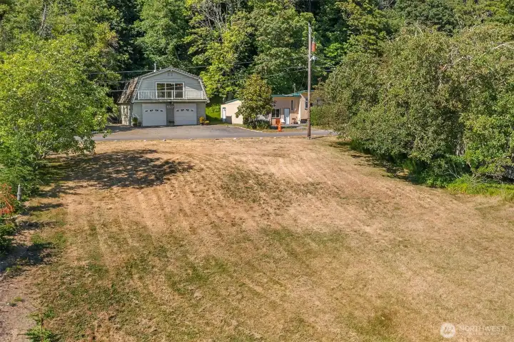 Property includes a water-side parcel that slopes down to the shoreline for miles of beachcombing.