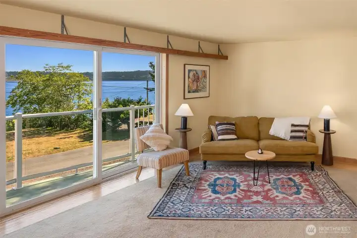 Brand new balcony doors give access to the fun view balcony. Have your morning coffee or evening cocktail while watching the occasional passing whale!