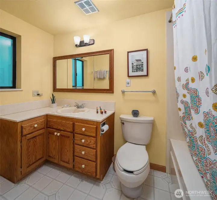 Bathroom with tub/shower.