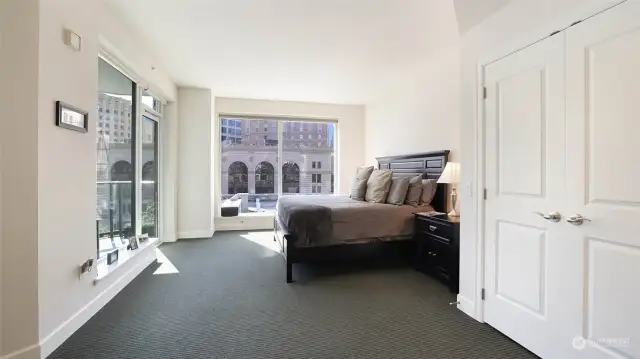Impressive owner's suite features a generously sized closet, floor to ceiling windows & a tastefully designed en-suite.
