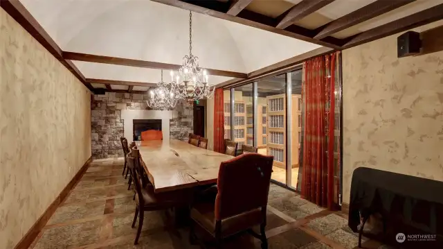 Superb wine cave with exposed beams, fireplace and wine locker.