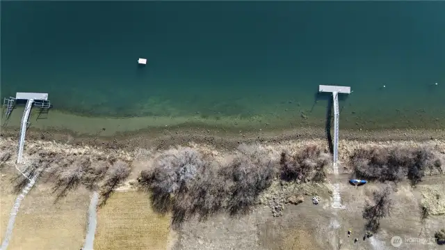 View of beach between docks
