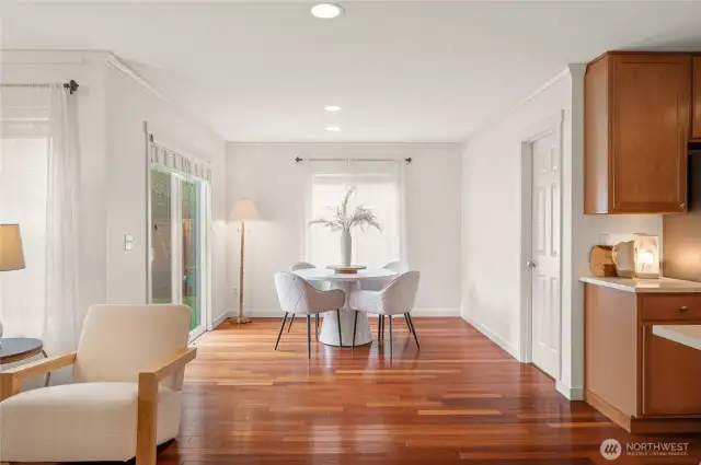 The casual dining area is accented with a window to let the outdoors in.