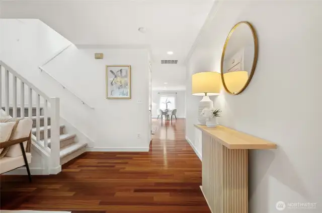 Ahead is the family room and kitchen with adjoining casual dining area.