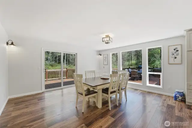 The Dining room features amazing outdoor views and opens onto the new deck.