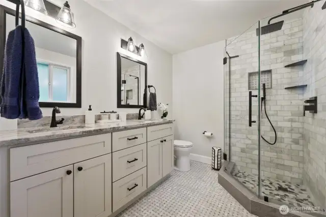 All new primary bath with double sinks and walk-in shower.