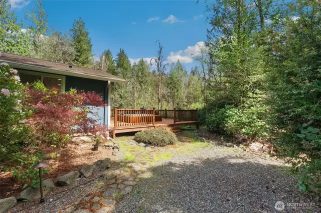 Side yard with access to/from deck.