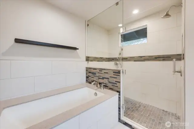 Jetted Tub and Separate Shower in the primary bath