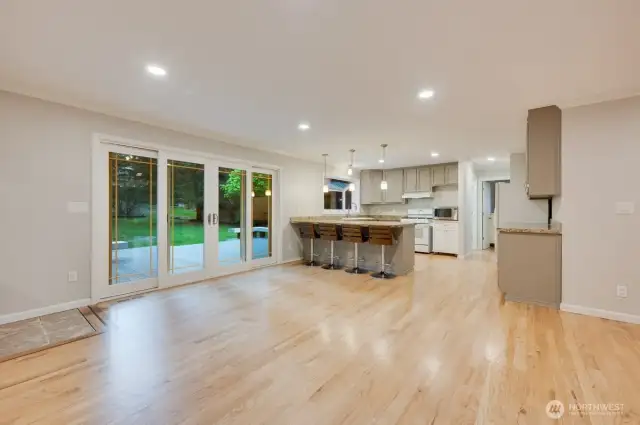 Oversized sliders accessing your trex deck and expansive yard.