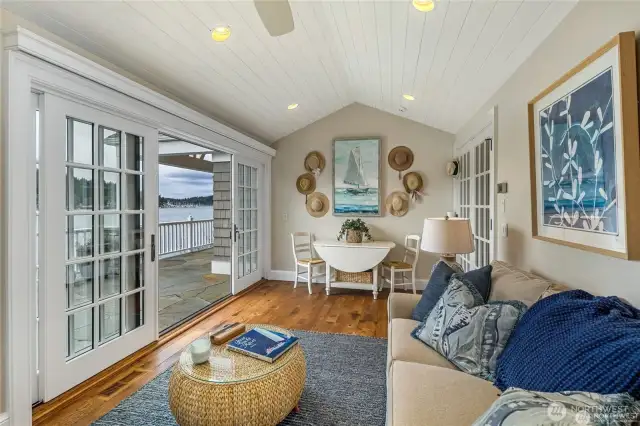 Downstairs sunroom, bedroom opens onto a sunny deck.