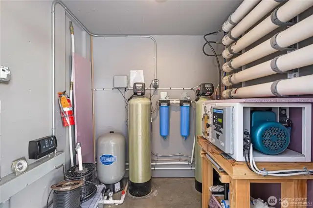 Desal room behind garage - 3 water sources: de-sal, private well, and shared well.