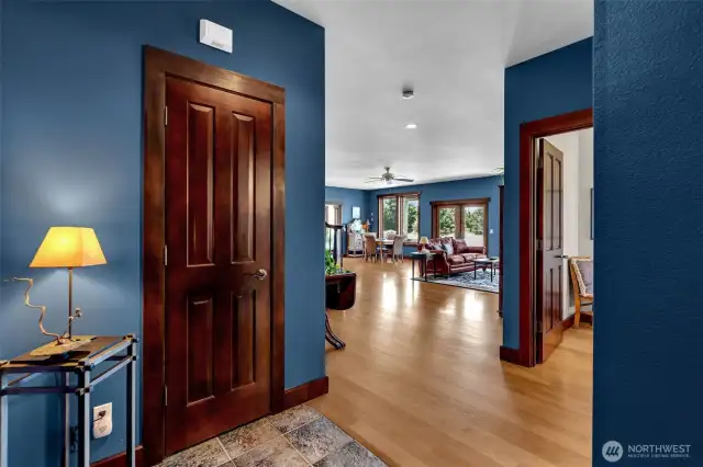 Entrance foyer. Solid core, raised panel clear vertical grain interior doors and trim throughout