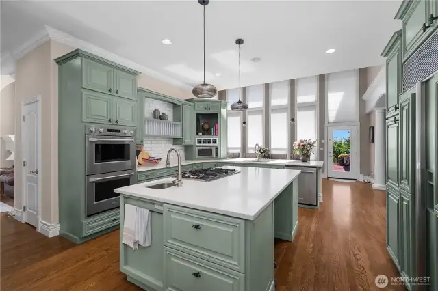 Bonus features include 2 dishwashers, 2 wine fridges, 3 garbage disposals, Sub Zero Freezer, Monogram Double Oven, range, steam drawer, in-island cooler drawers, Butler and walk-in pantry.