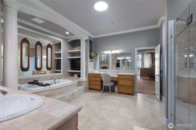 5 piece en suite featuring a jetted tub, gas fireplace and a generous walk-in wardrobe.