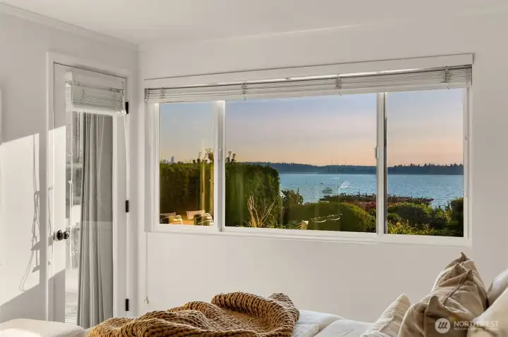 View from the primary suite.  The glass door opens into the living room (not the exterior).  Insane views.