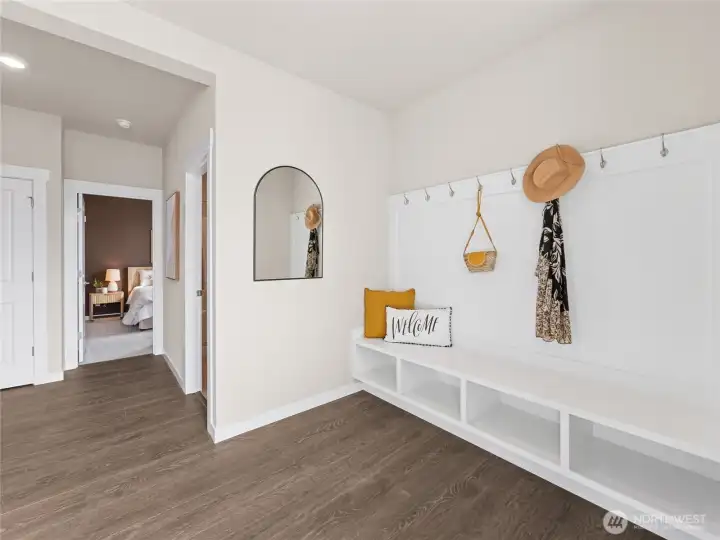 Spacious Entry with built-in drop zone. Photo is representational. Actual home is under construction and finishes and paint colors may vary. See site agent for details....