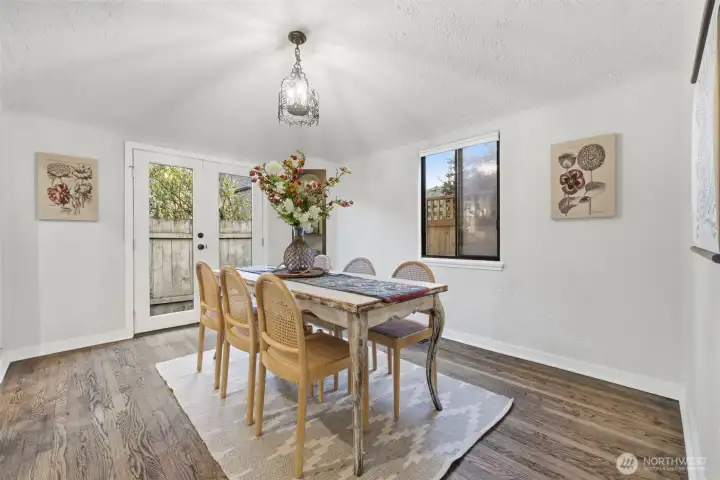 The doors here open to the easy-to-maintain back yard.