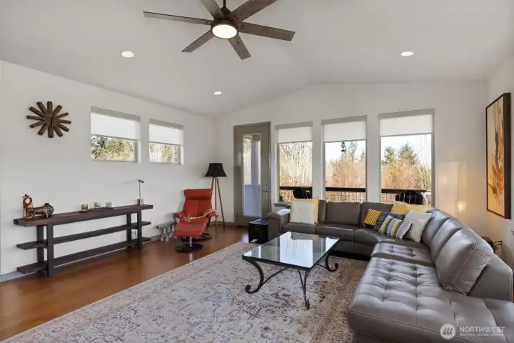 Living room with door to covered patio.