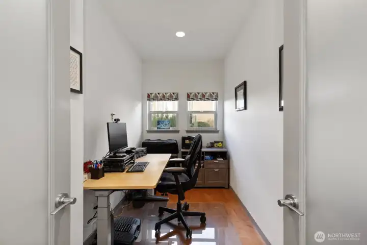 Office space located behind kitchen.