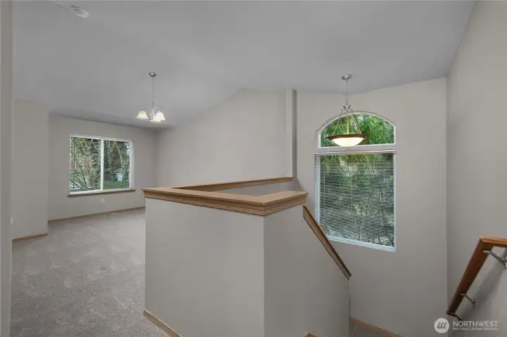 Second floor landing looking towards the large loft area.