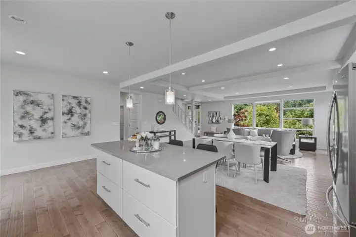 Kitchen island accomodates food prep and seating for three!