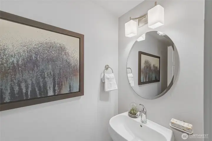 The powder room is off the front entryway.
