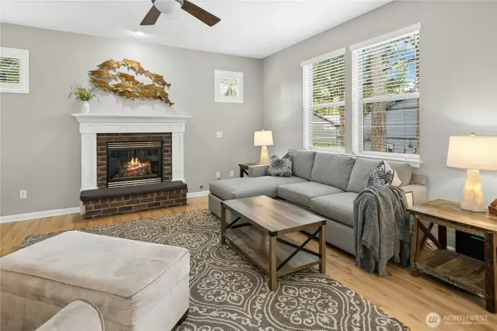 Large living room with natural gas fireplace