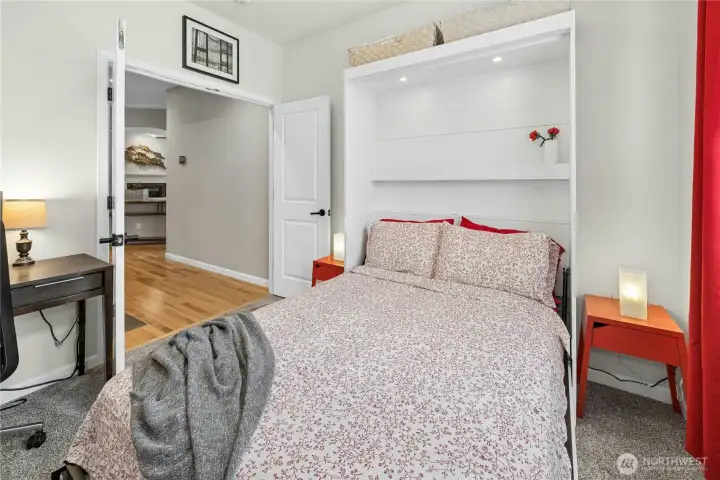 Main floor bedroom with full size Murphy bed. A terrific guest room or multigenerational living