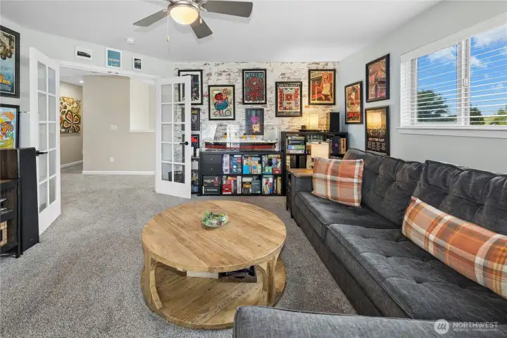 Media room with glass French doors