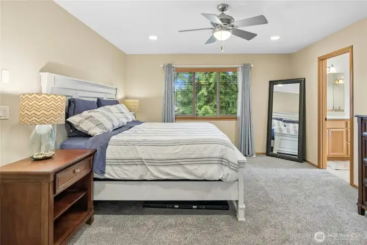Primary bedroom with room for a large king bed and more