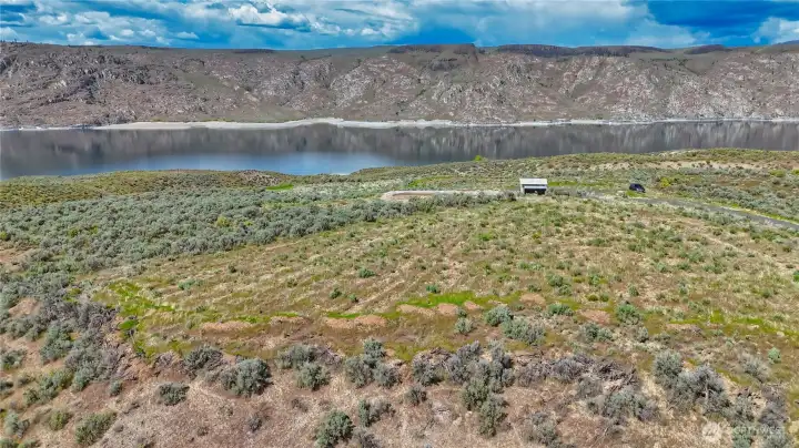 Easy to view and envision your forever or seasonal home here. Contiguous parcel with domestic/irrigation water hookups.