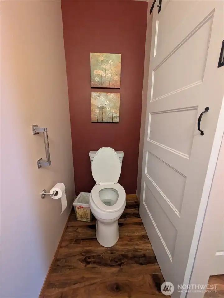 main floor 1/2 bath with sliding door