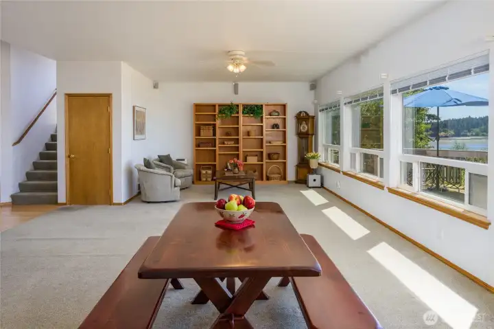 Open concept kitchen/dining/living area.