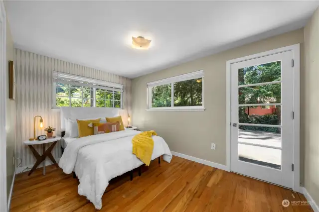 Light-filled, cozy bedroom designed for the perfect night's sleep, offering a serene and inviting atmosphere.