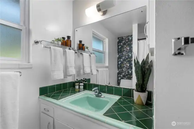 Upper level main bathroom boasting unique midcentury charm and character.