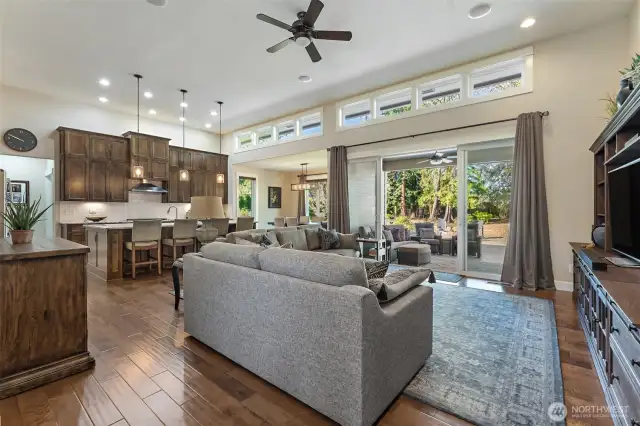 Great room to Kitchen, Dining Room and Double Sliders to Covered Patio with Ceiling Fan