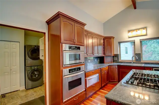 Gourmet Kitchen with high-end appliances and insta-hot sink.
