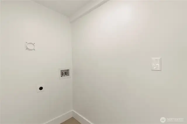 Laundry room located off of kitchen