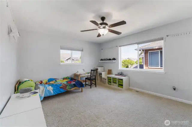 Huge second bedroom with large closet, ceiling fan and easy access to the main bathroon.