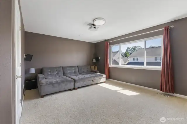 Enjoy movie nights or game days in the dedicated media room, complete with a screen and equipment ready to go. Located on the second floor, this versatile space also features a large closet—perfect for storing games, gear, or extra tech.