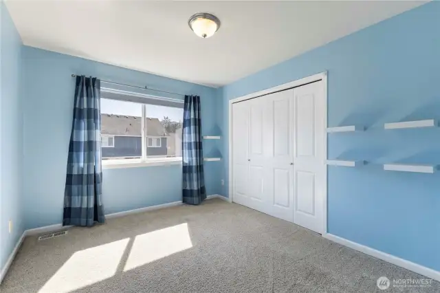 The third bedroom features a large closet and is located close to the main bathroom.