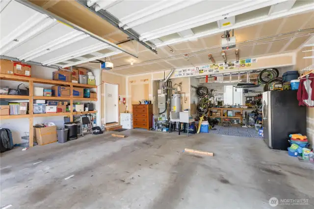 3-Car tandem garage with work space, extra storage room and wired for a generator.