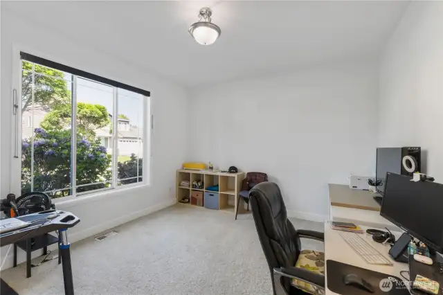 French doors leads to a large main floor office located off the entry.