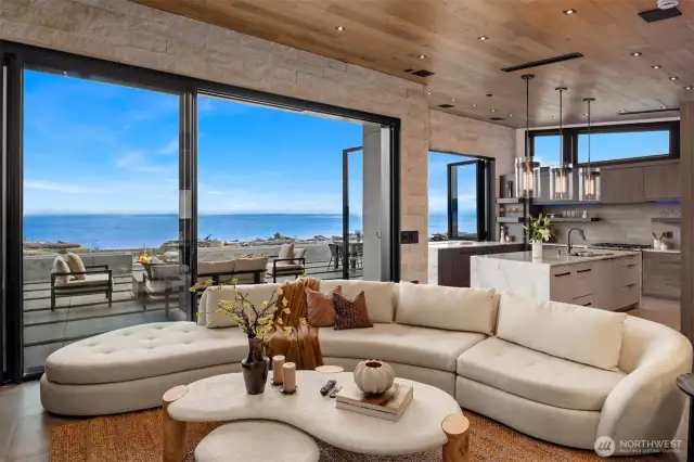 This home is designed to blur the lines between indoors and out, creating a stunning backdrop of ever-changing maritime scenery and the Olympic Mountains.