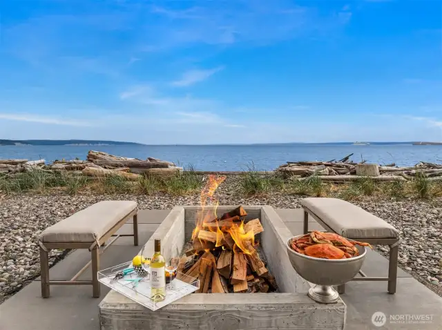 Enjoy your fresh catch of the day beside a large firepit, thoughtfully designed for cooking and entertaining large gatherings.